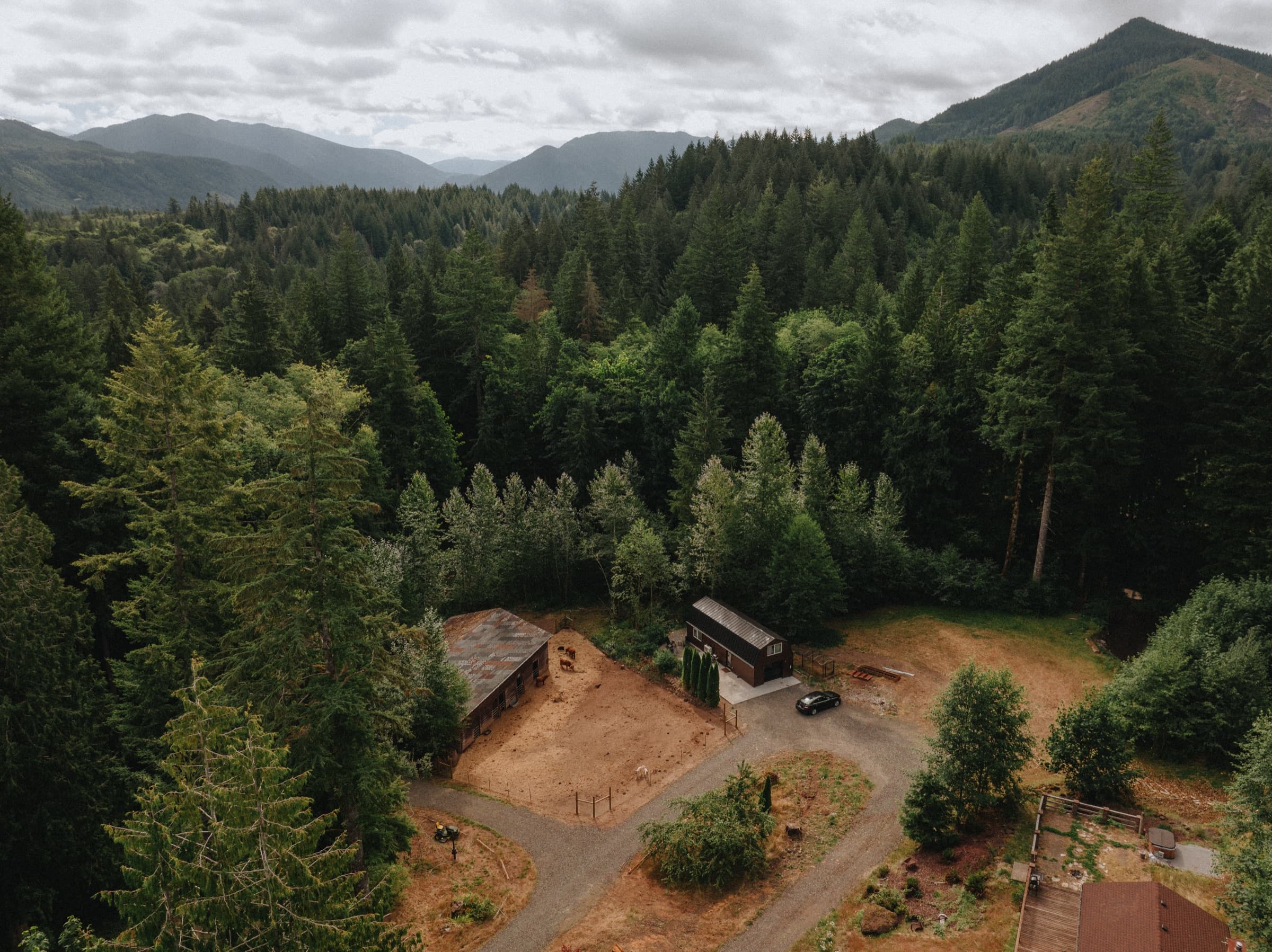 Aerial drone view of Highland Farms with mountains